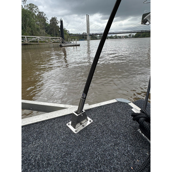 Reelax RX42200 black mooring whip mounted at a dock, showing base and pole